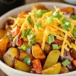 Roasted potatoes with cheese and onions