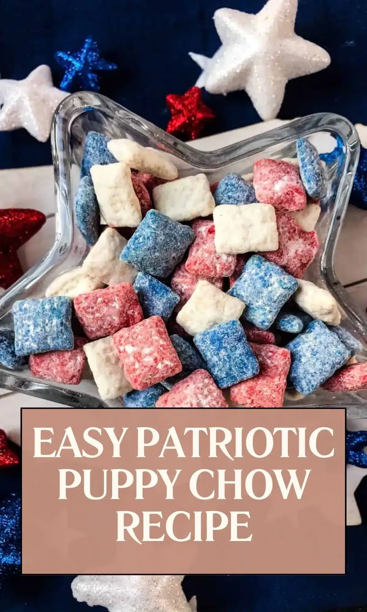 Mixed red, white and blue patriotic puppy chow in clear glass star-shaped bowl with text overlay reading 'EASY PATRIOTIC PUPPY CHOW RECIPE', surrounded by decorative glittery stars on navy blue star-patterned fabric