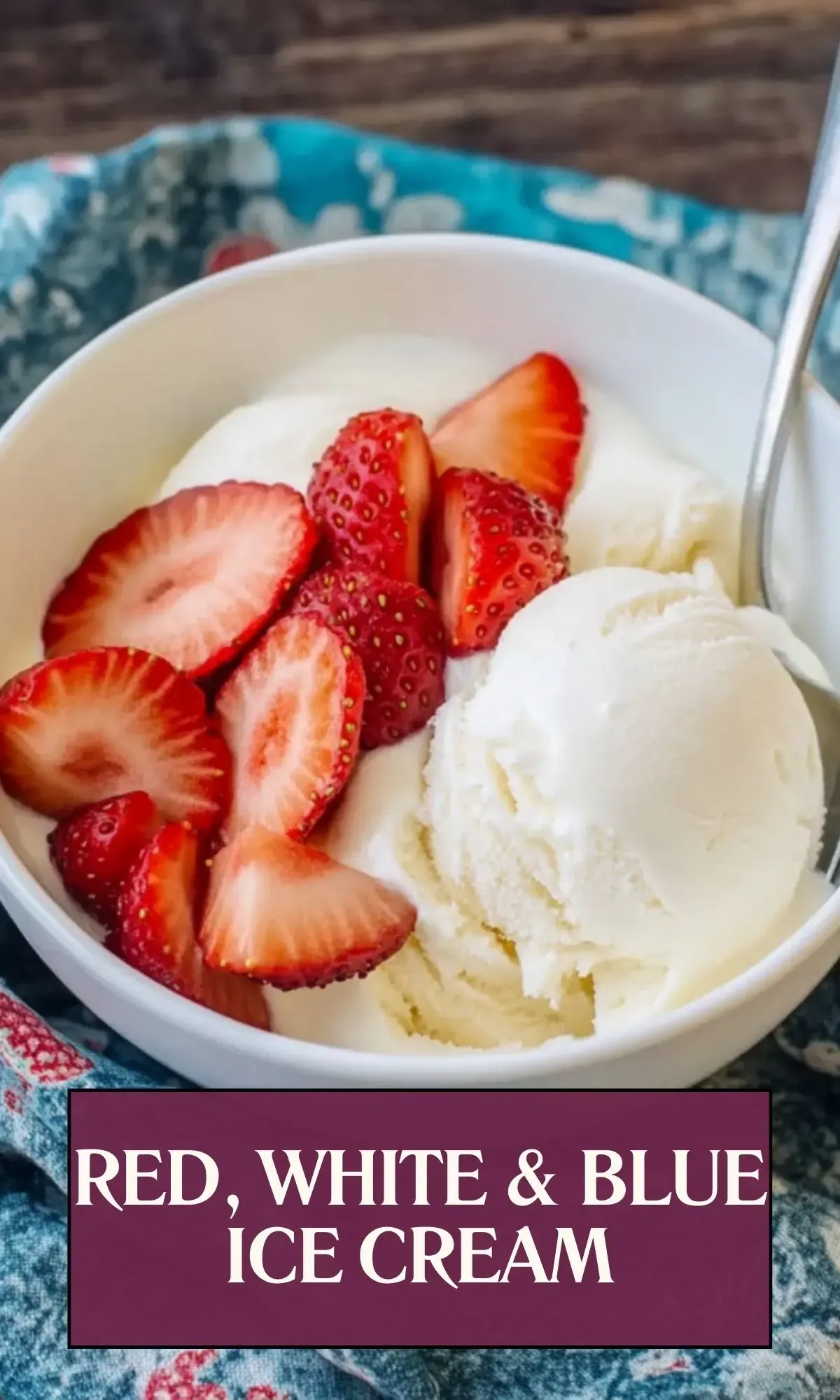 Creamy vanilla ice cream served with fresh sliced strawberries in a white bowl