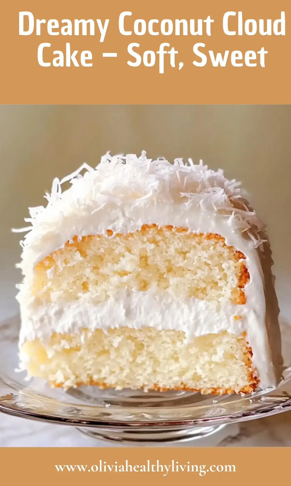 Close-up cross-section of coconut cloud cake showing moist yellow layers and creamy white frosting