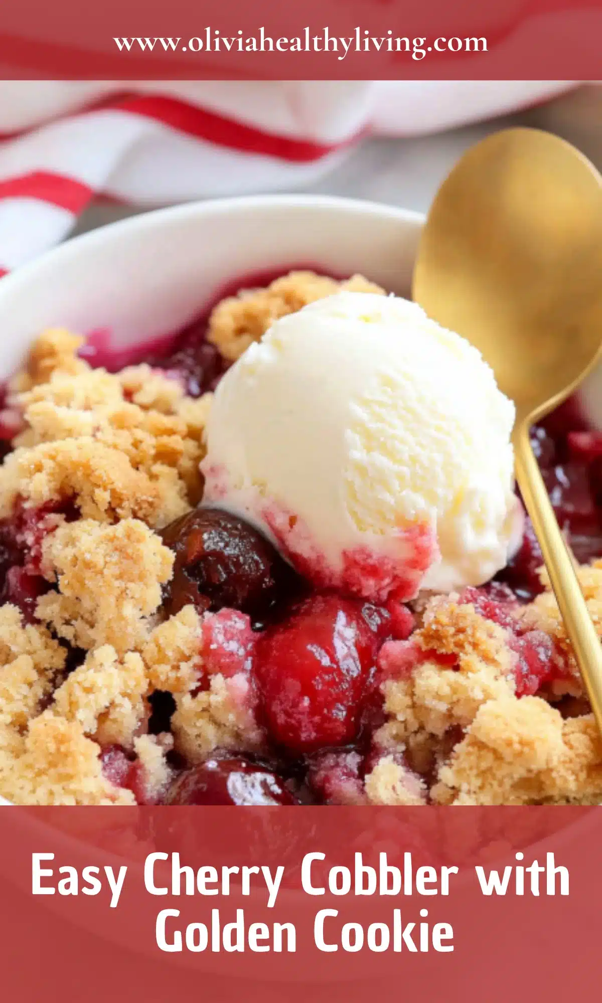 Close up view of cherry cobbler with golden crumbly topping and juicy red cherries bubbling underneath