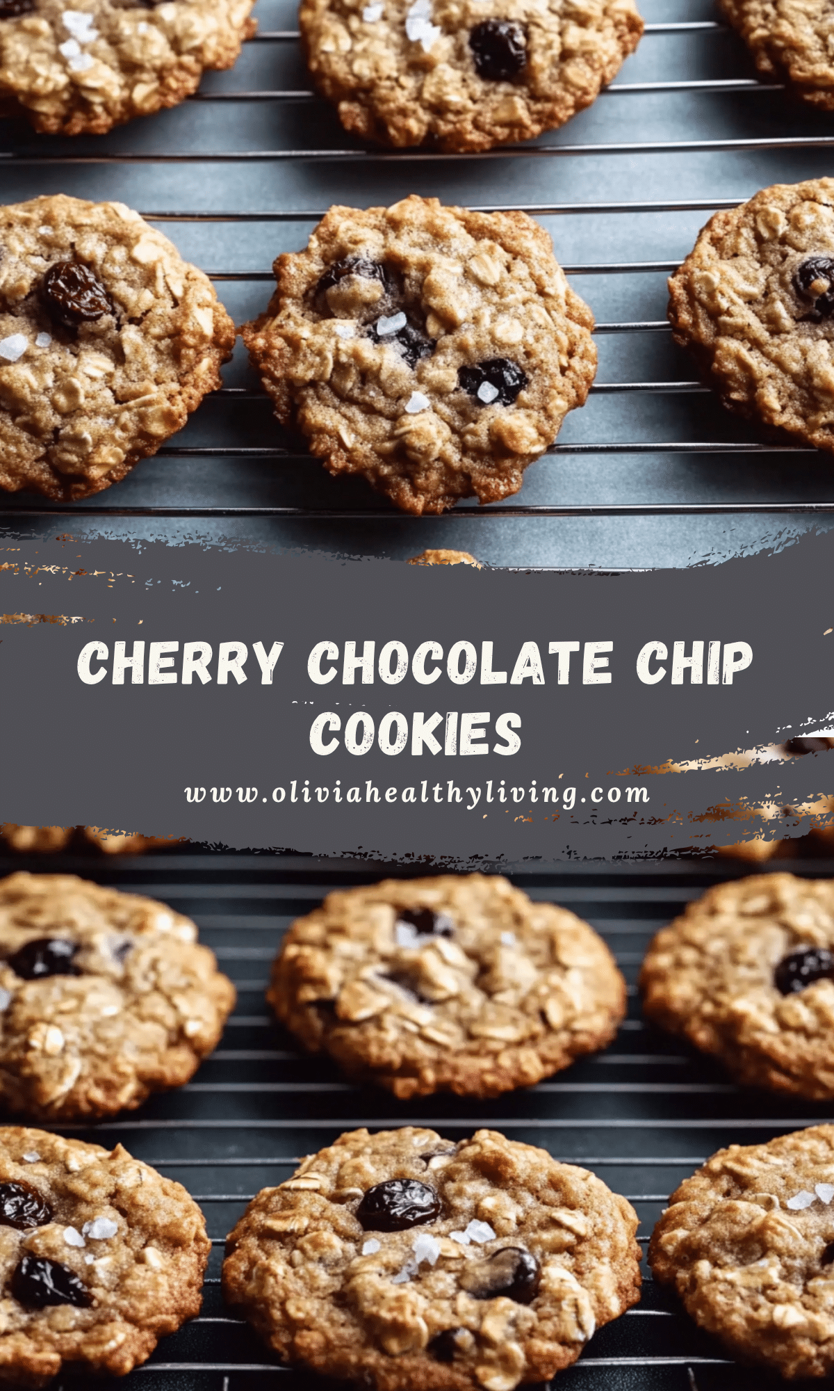 Cherry chocolate chip cookies cooling on black wire rack showing perfect texture with visible oats, dried cherries and chocolate chips