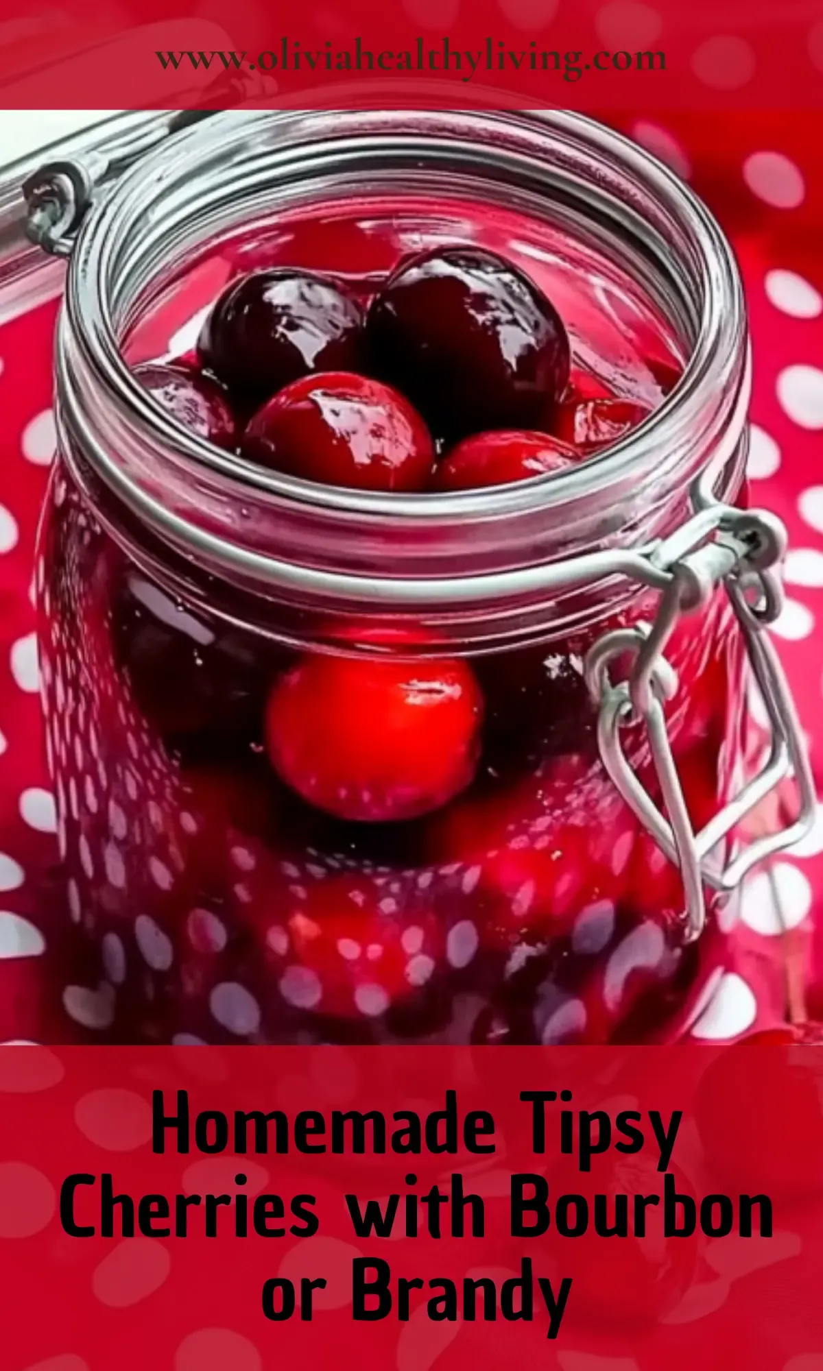 Homemade tipsy cherries with bourbon in glass jar with hinged lid on red polka dot background