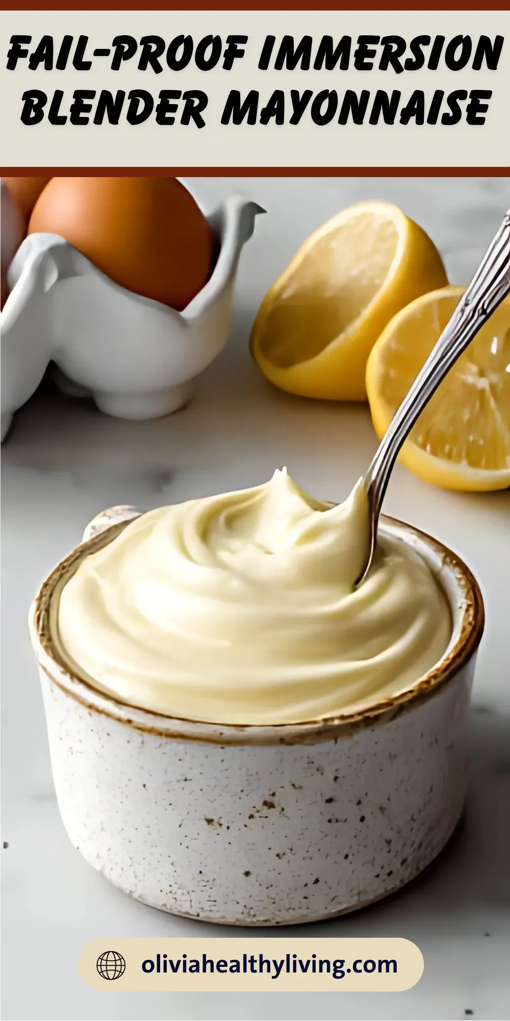Vertical Pinterest image showing creamy homemade mayonnaise in a ceramic bowl with lemons and eggs in the background, overlaid with text “Fail-Proof Immersion Blender Mayonnaise” and the website oliviahealthyliving.com.


