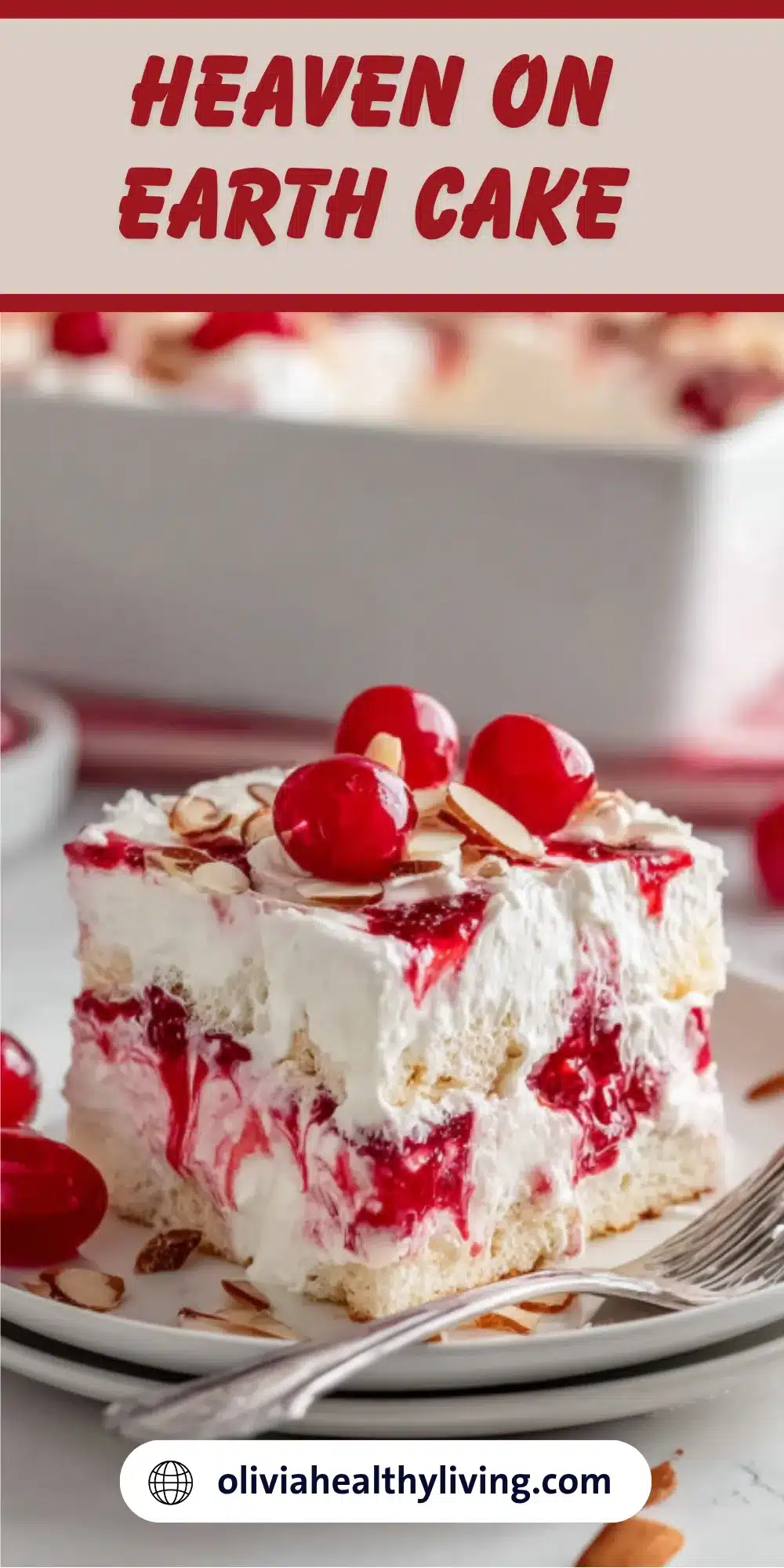 Heaven on Earth Cake slice with layers of angel food cake, cherry pie filling, vanilla pudding and whipped topping garnished with cherries and almonds
