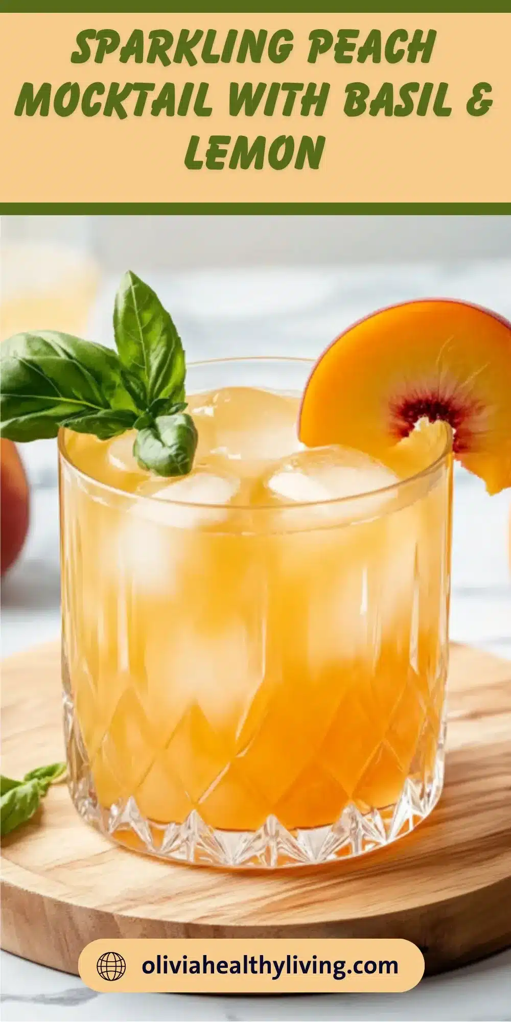 Sparkling peach mocktail with basil and lemon garnish in crystal glass on wooden board