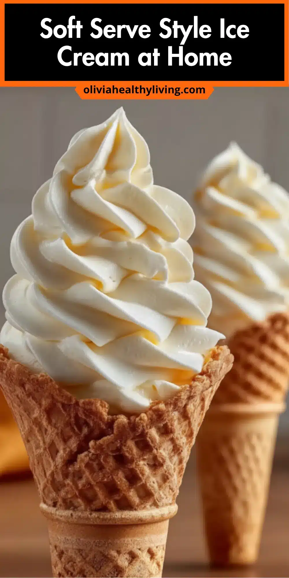 Vanilla soft serve ice cream in waffle cone with orange swirl