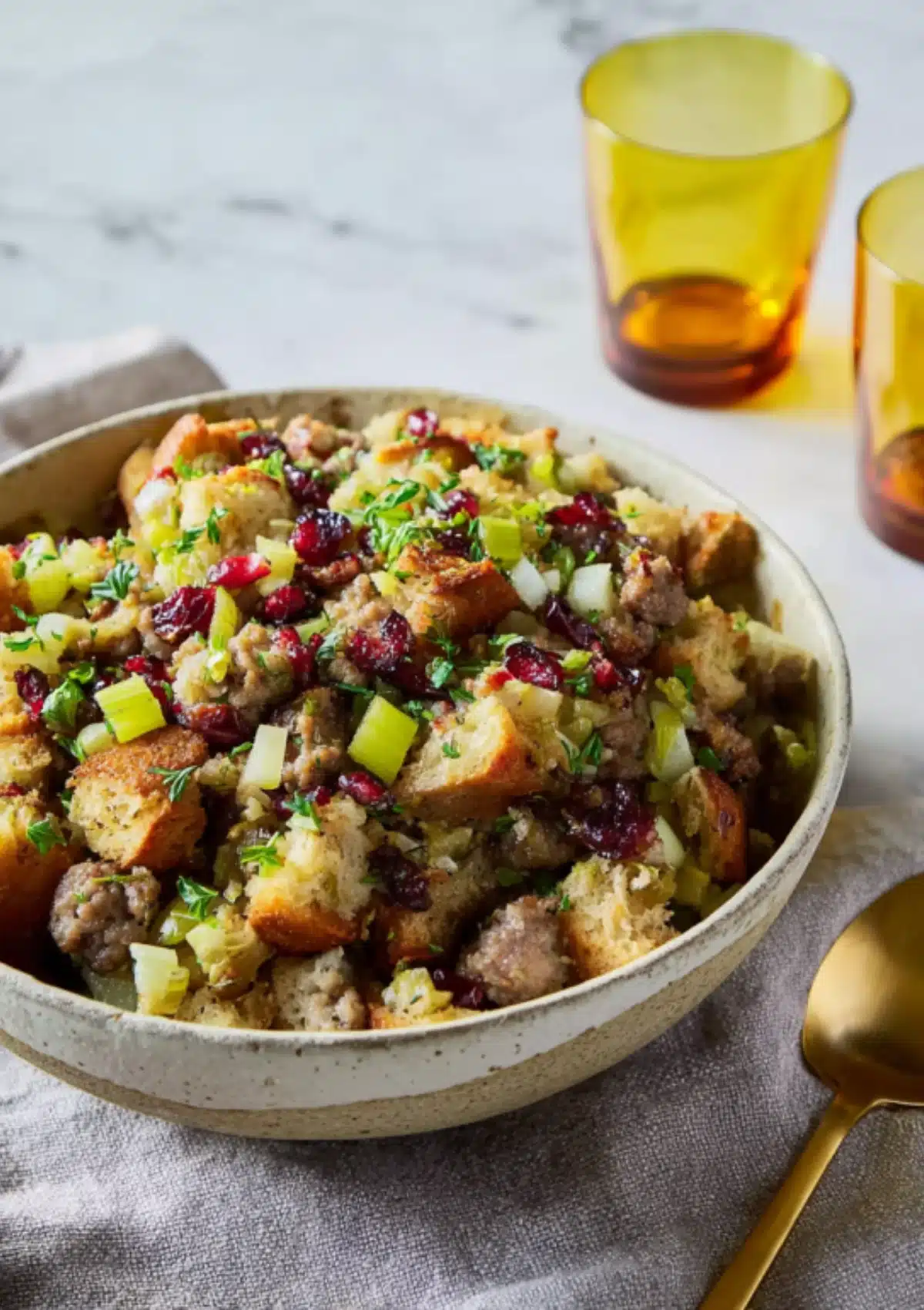 Cranberry sausage stuffing in serving bowl