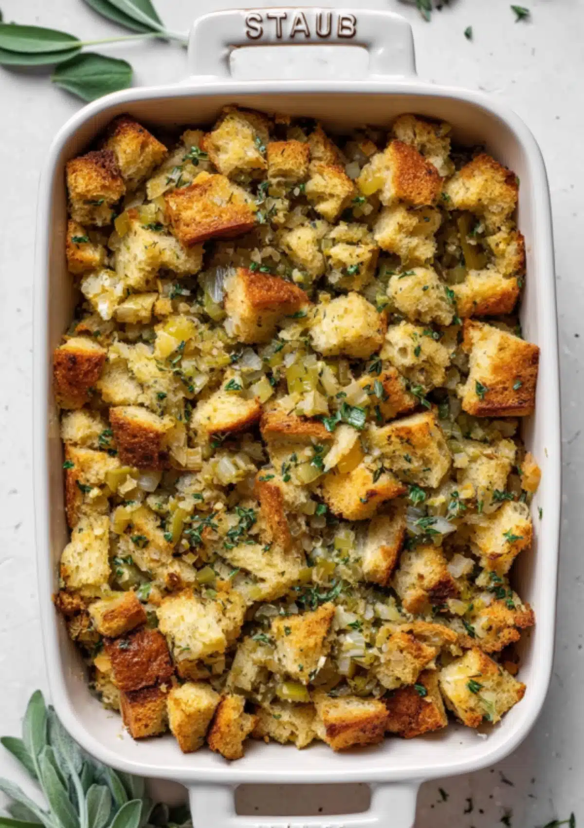 Golden bread stuffing in ceramic dish