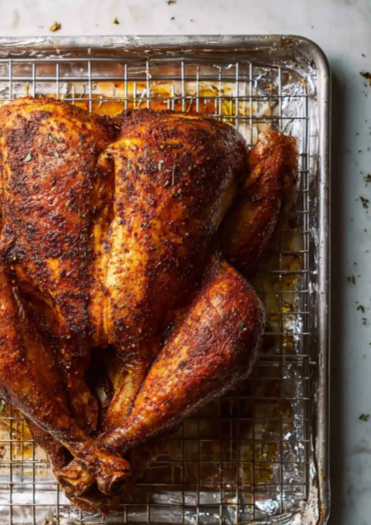 Roasted turkey on baking sheet, overhead view