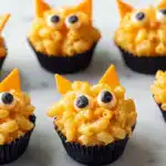 Row of monster mac and cheese cups showing detail and texture