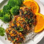 Single serving of sesame orange chicken with rice and broccoli
