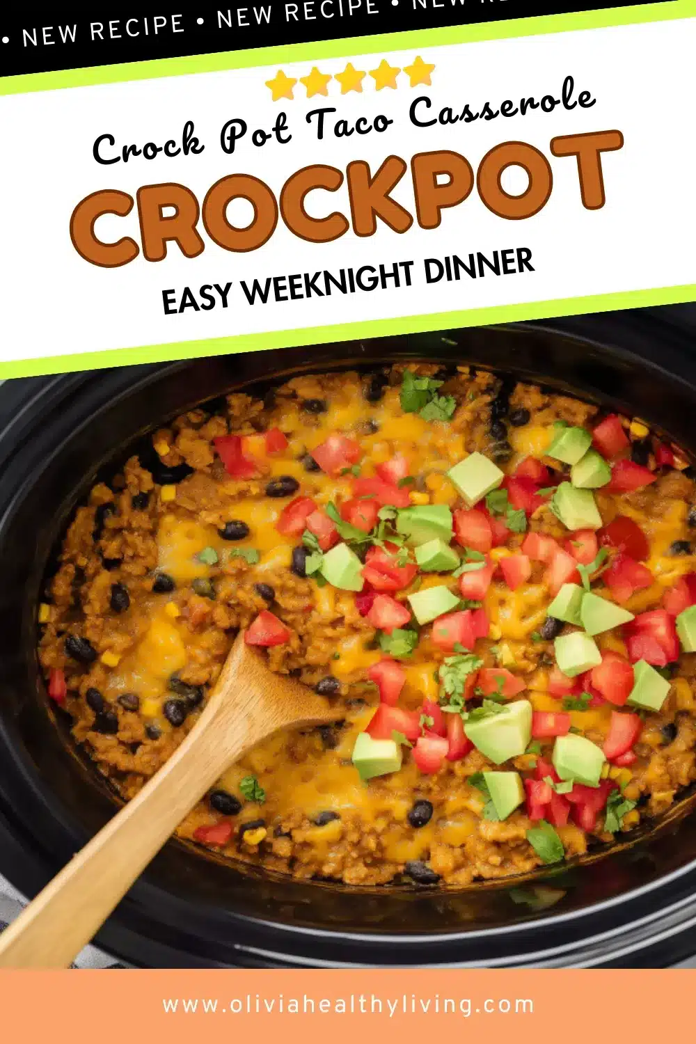 Black crock pot filled with taco casserole featuring melted cheddar cheese, ground beef, black beans, corn, topped with fresh avocado and tomatoes with wooden spoon